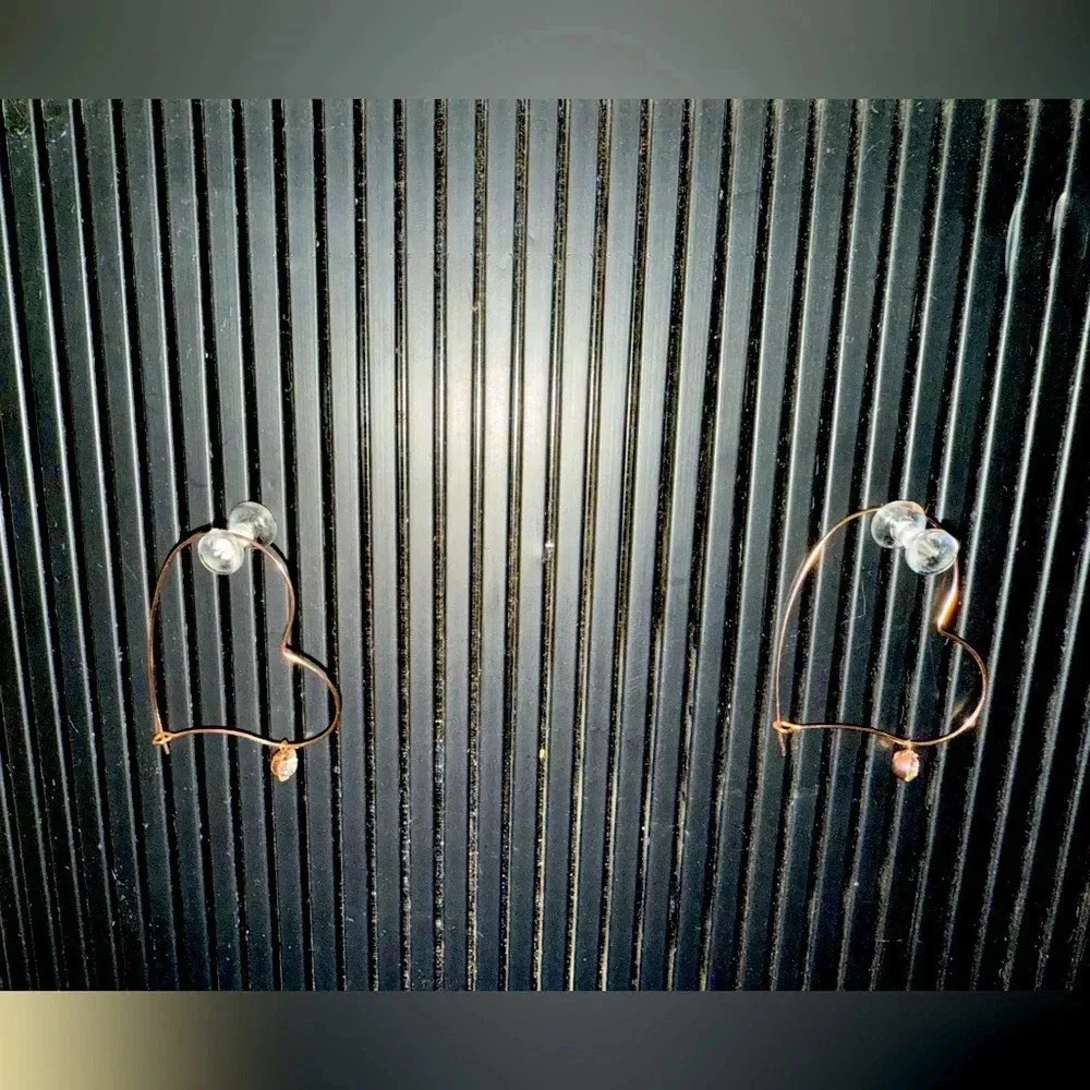 Rose gold heart earrings with diamond stone